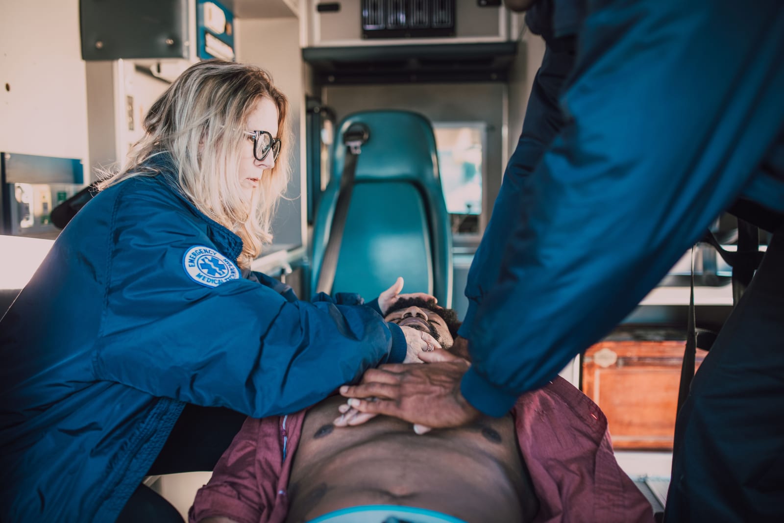 A paramedic performing CPR